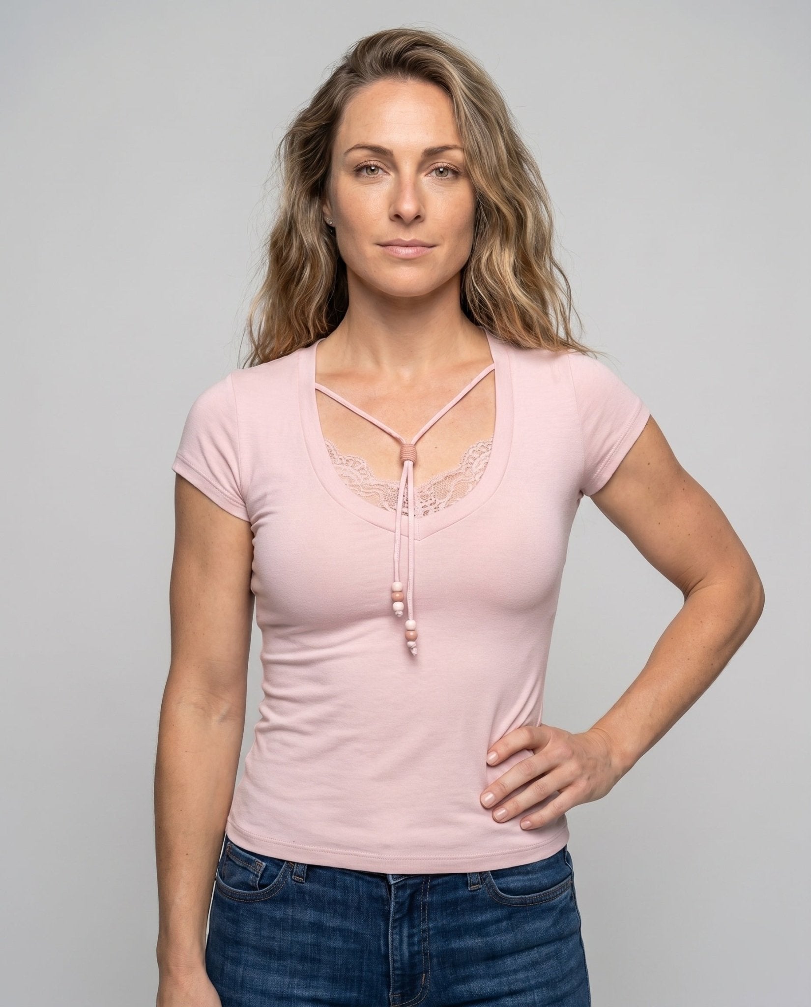Women's form-fitting top with delicate lace trim and playful knot detail - Chichicherry