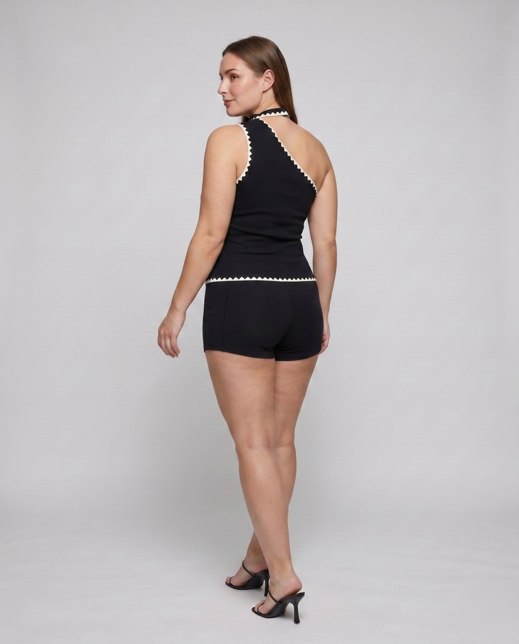Women’s jumpsuit with elegant choker neckline and fine lace accents - Chichicherry