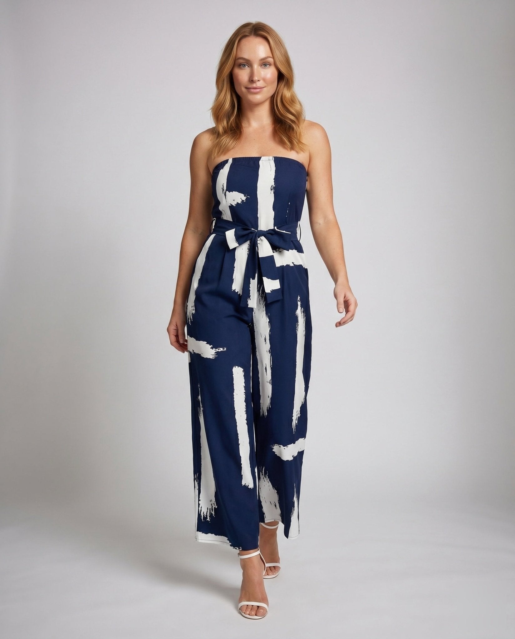 Women's jumpsuit with strapless design and stylish tie belt - Chichicherry