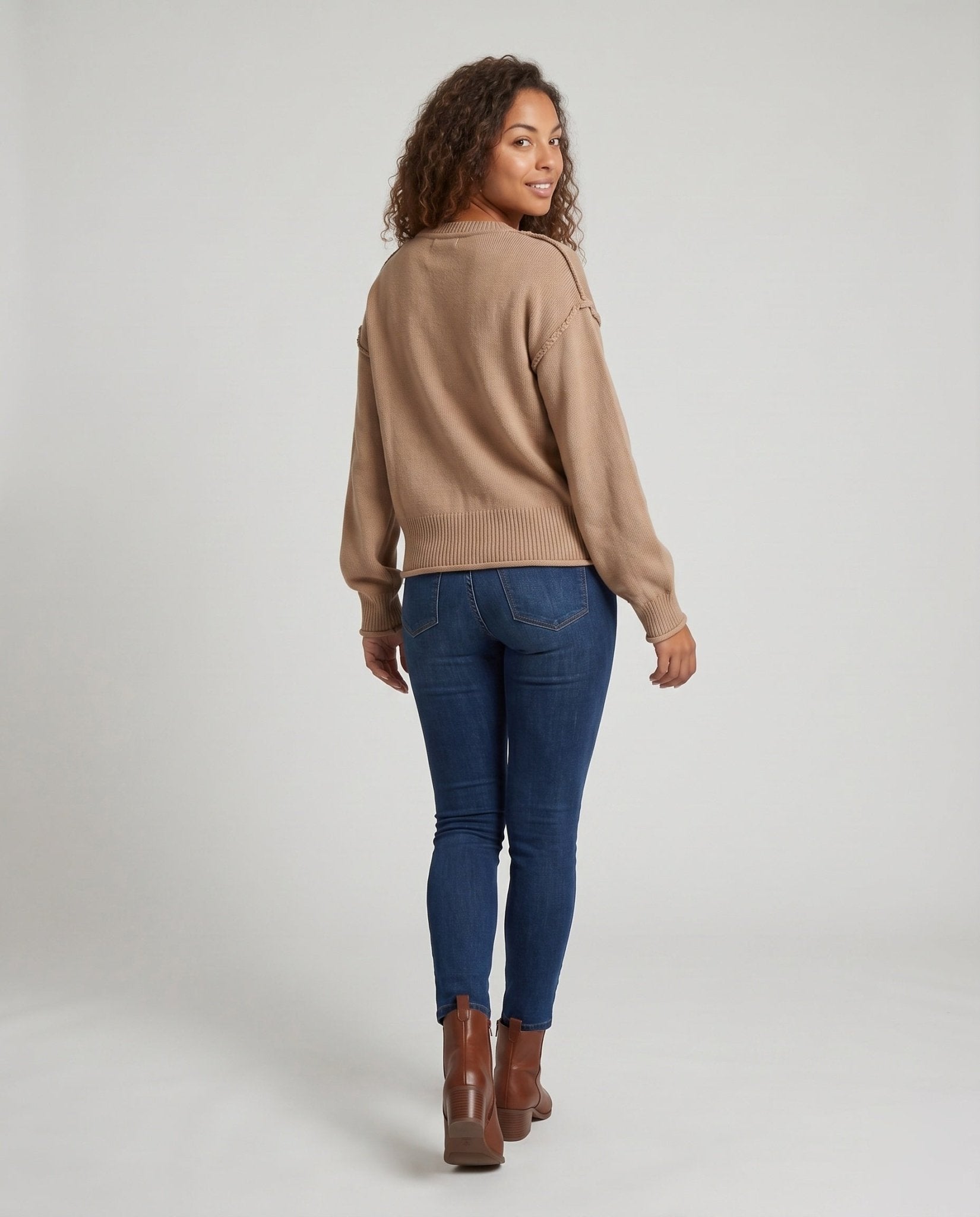 Women's knit sweater with unique structural details and a practical chest pocket - Chichicherry