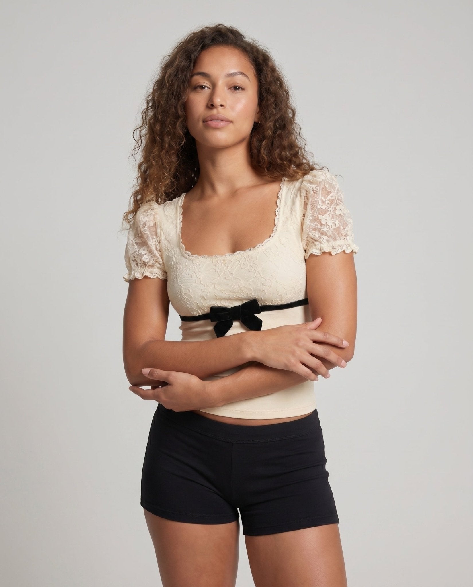Women's lace top with voluminous ruffle hems and elegant waistband - Chichicherry