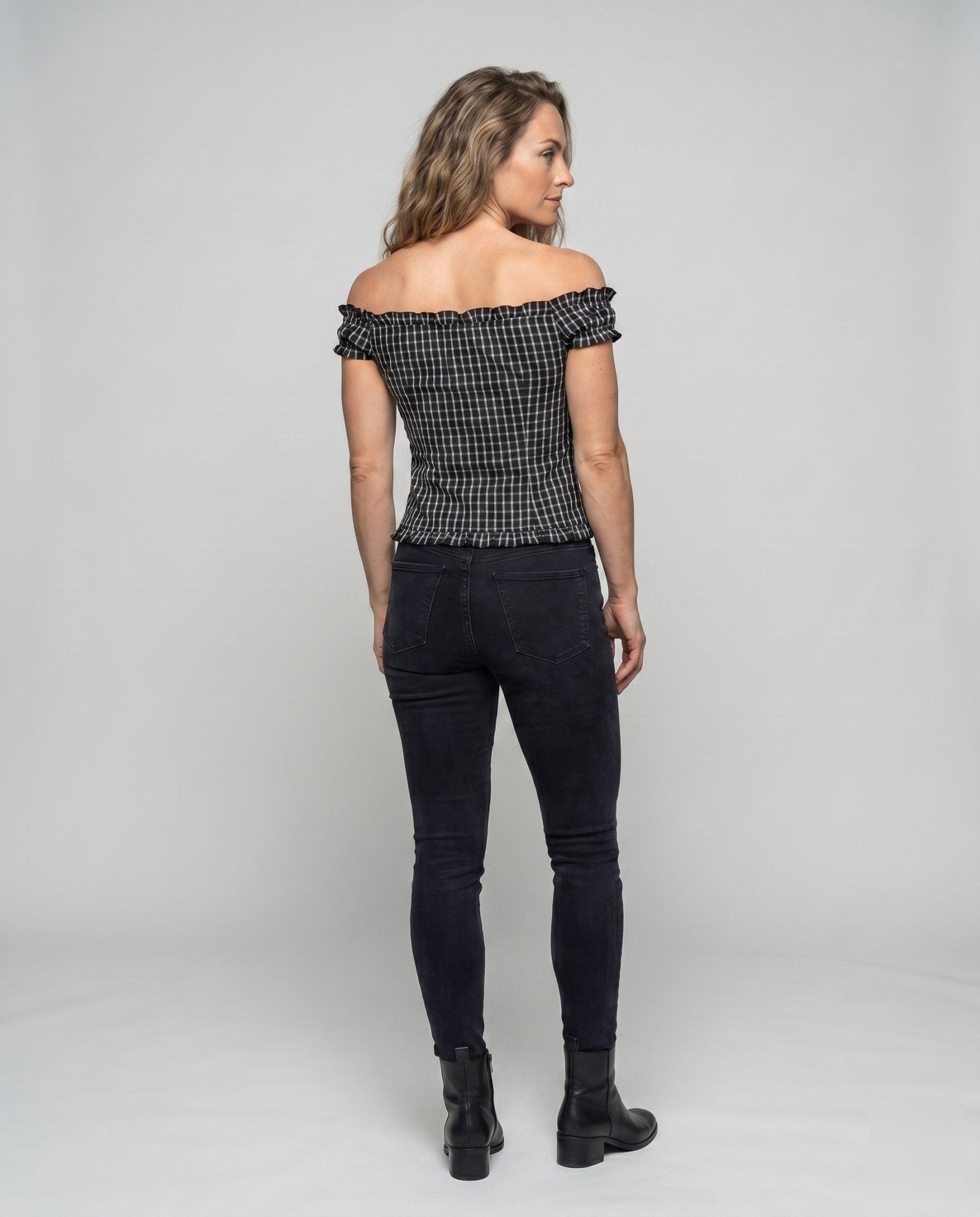 Women’s lace-up blouse with playful ruffle design - Chichicherry