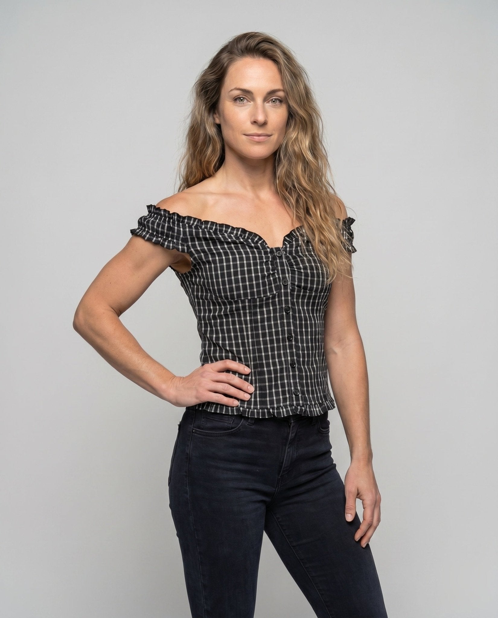 Women’s lace-up blouse with playful ruffle design - Chichicherry