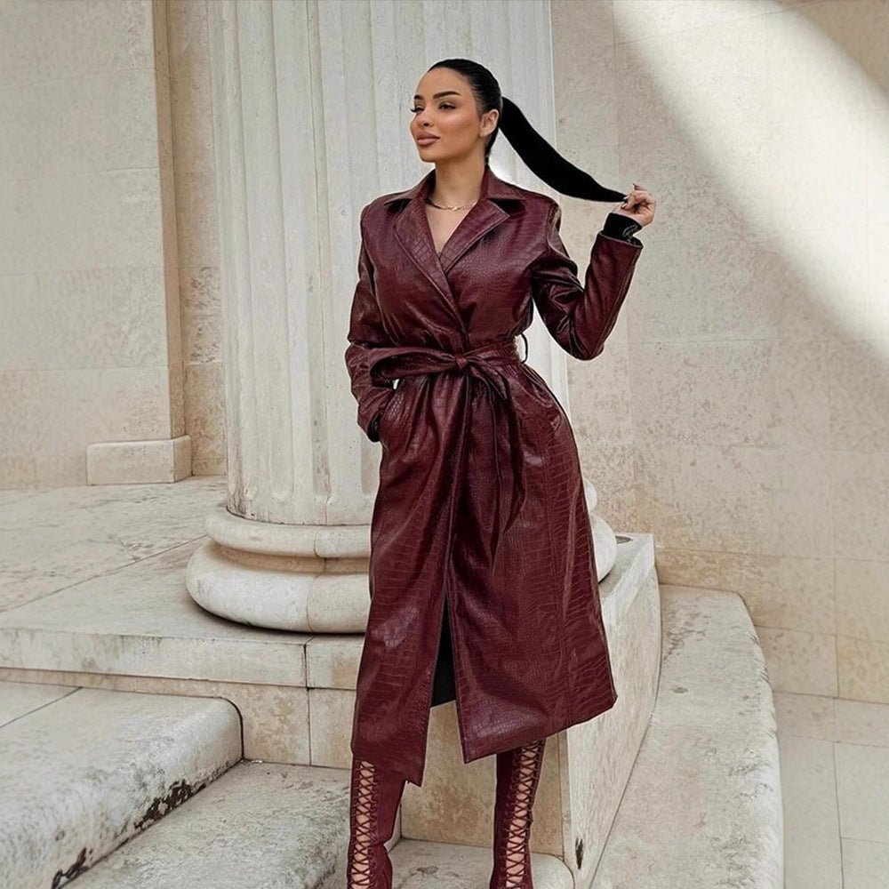 Women's long coat made of faux leather with crocodile embossing and waist belt Chichicherry - Chichicherry