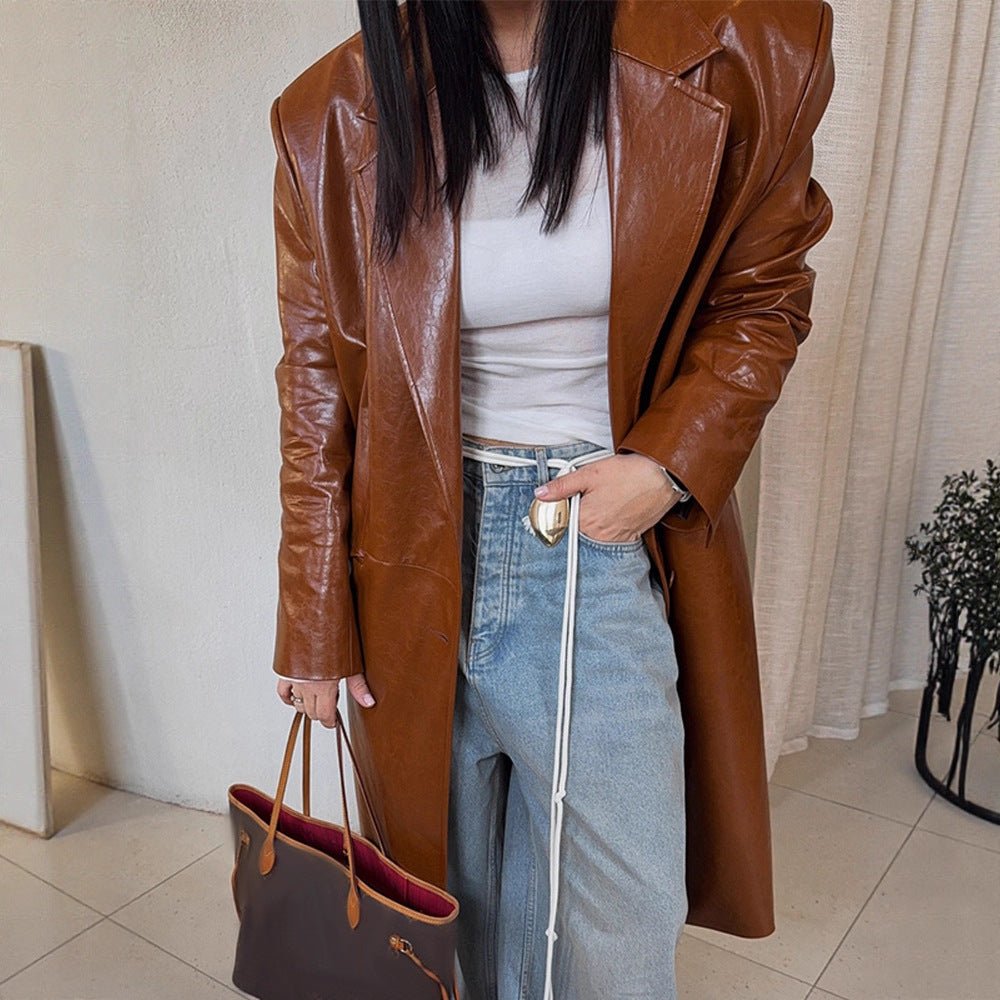 Women's long-cut patent leather trench coat with lapel collar and boxy oversized fit Chichicherry - Chichicherry