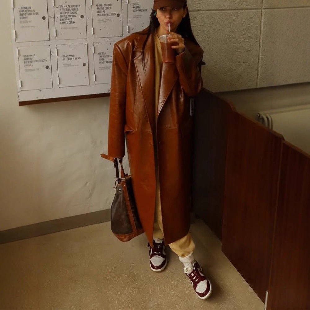 Women's long-cut patent leather trench coat with lapel collar and boxy oversized fit Chichicherry - Chichicherry