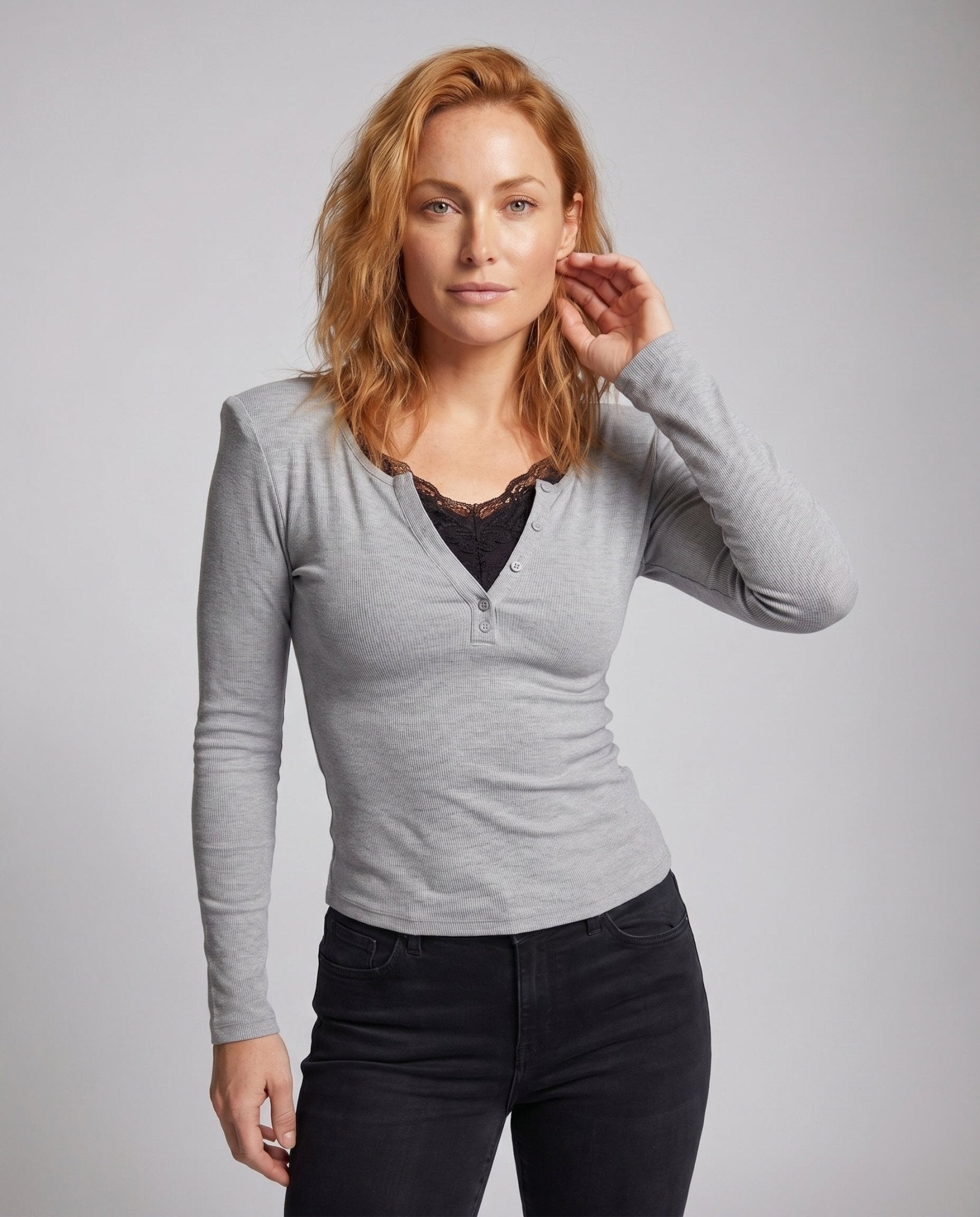 Women's long sleeve shirt with button placket and modern shoulder details - Chichicherry