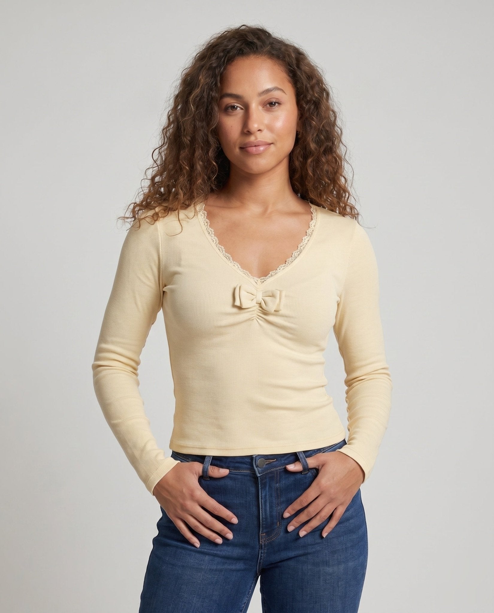 Women's long sleeve shirt with playful bow neckline and ruffle details - Chichicherry