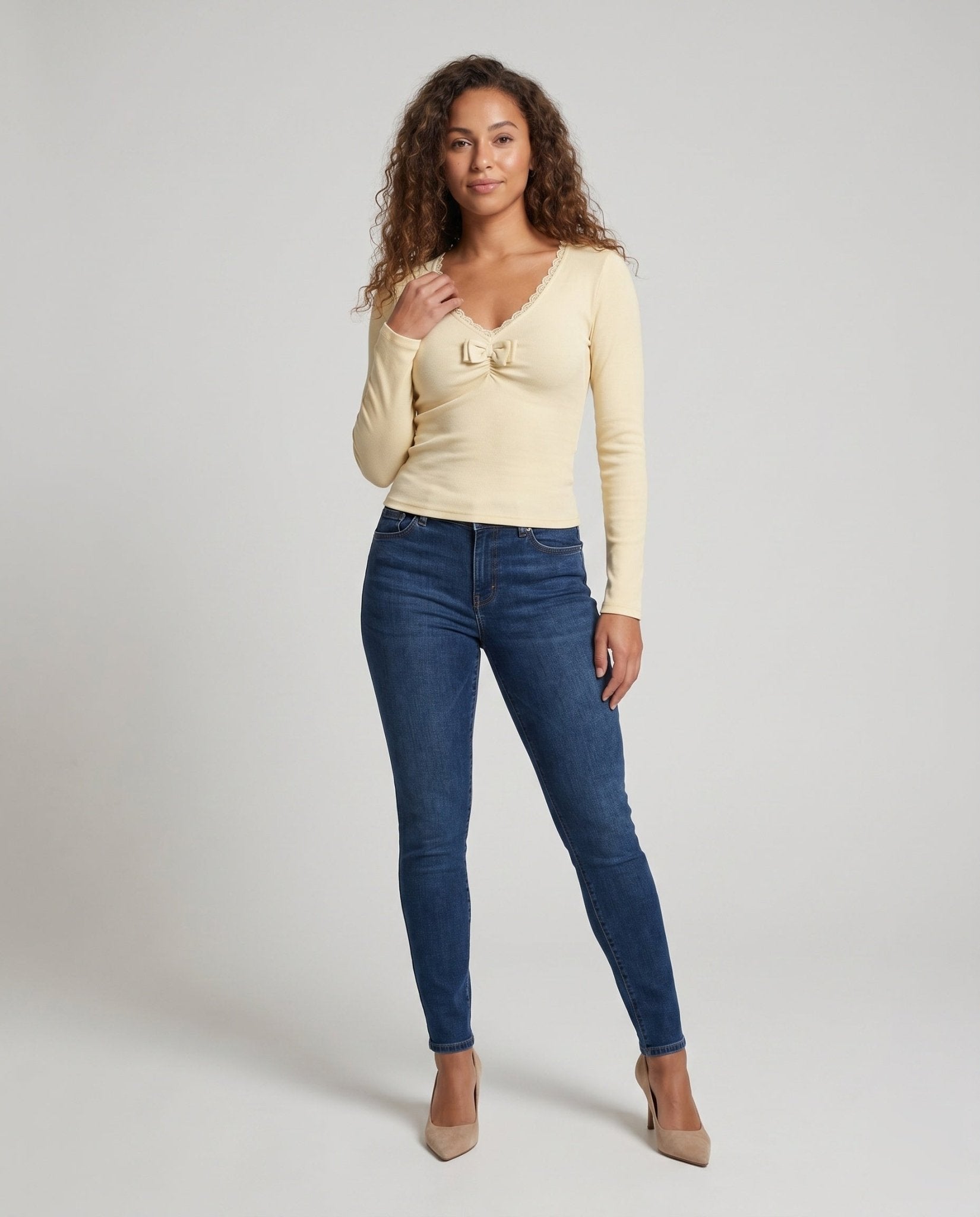 Women's long sleeve shirt with playful bow neckline and ruffle details - Chichicherry