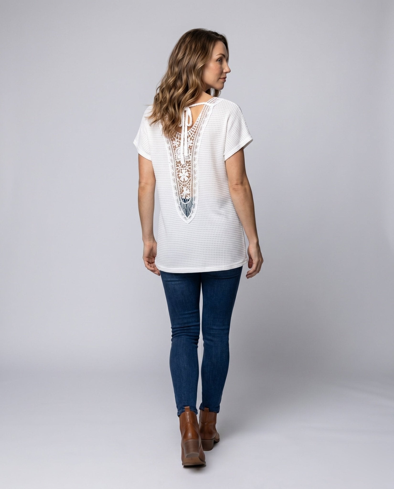 Women's loose knit top with modern V-neckline and casual sleeves - Chichicherry