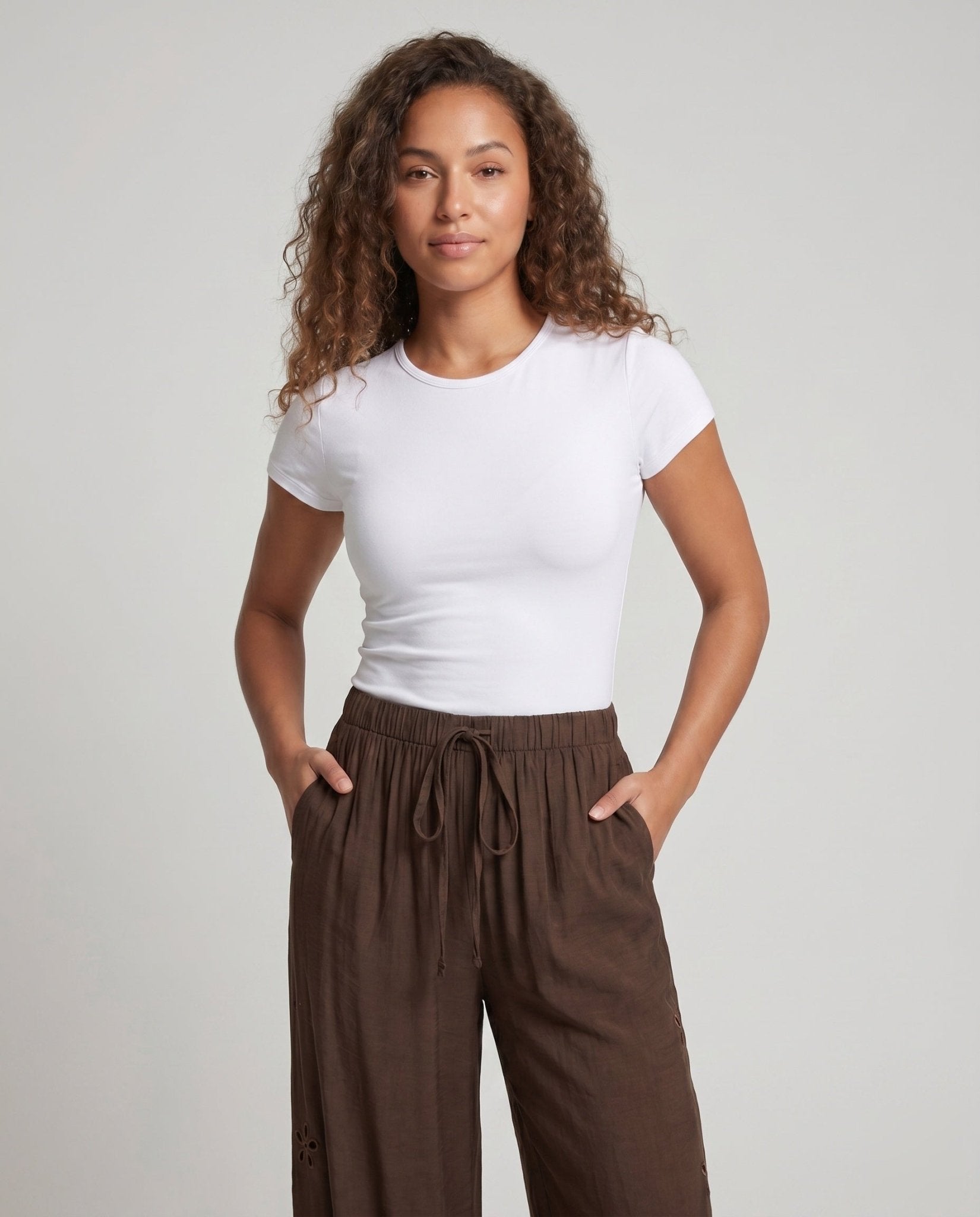 Women's loosely cut palazzo pants with elastic waistband and tie belt - Chichicherry