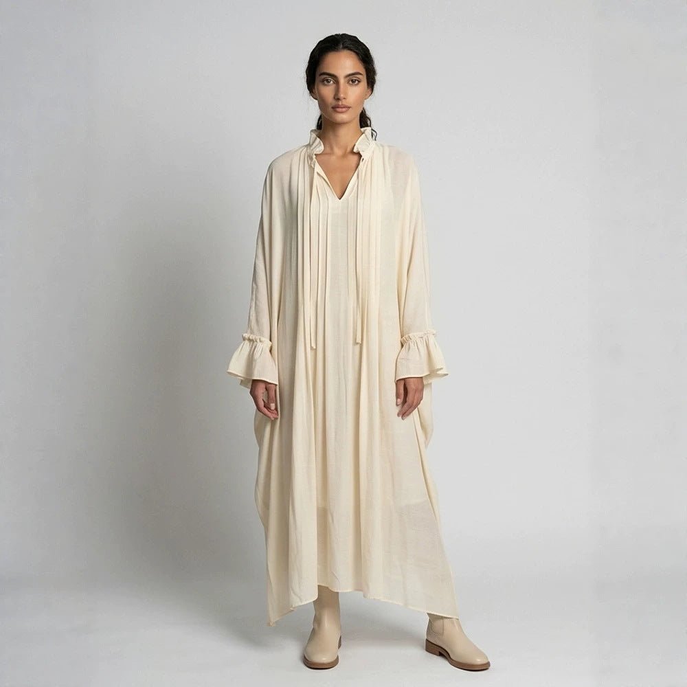 Women's maxi dress in kaftan style with ruffled collar, tie straps, and voluminous sleeves Chichicherry - Chichicherry