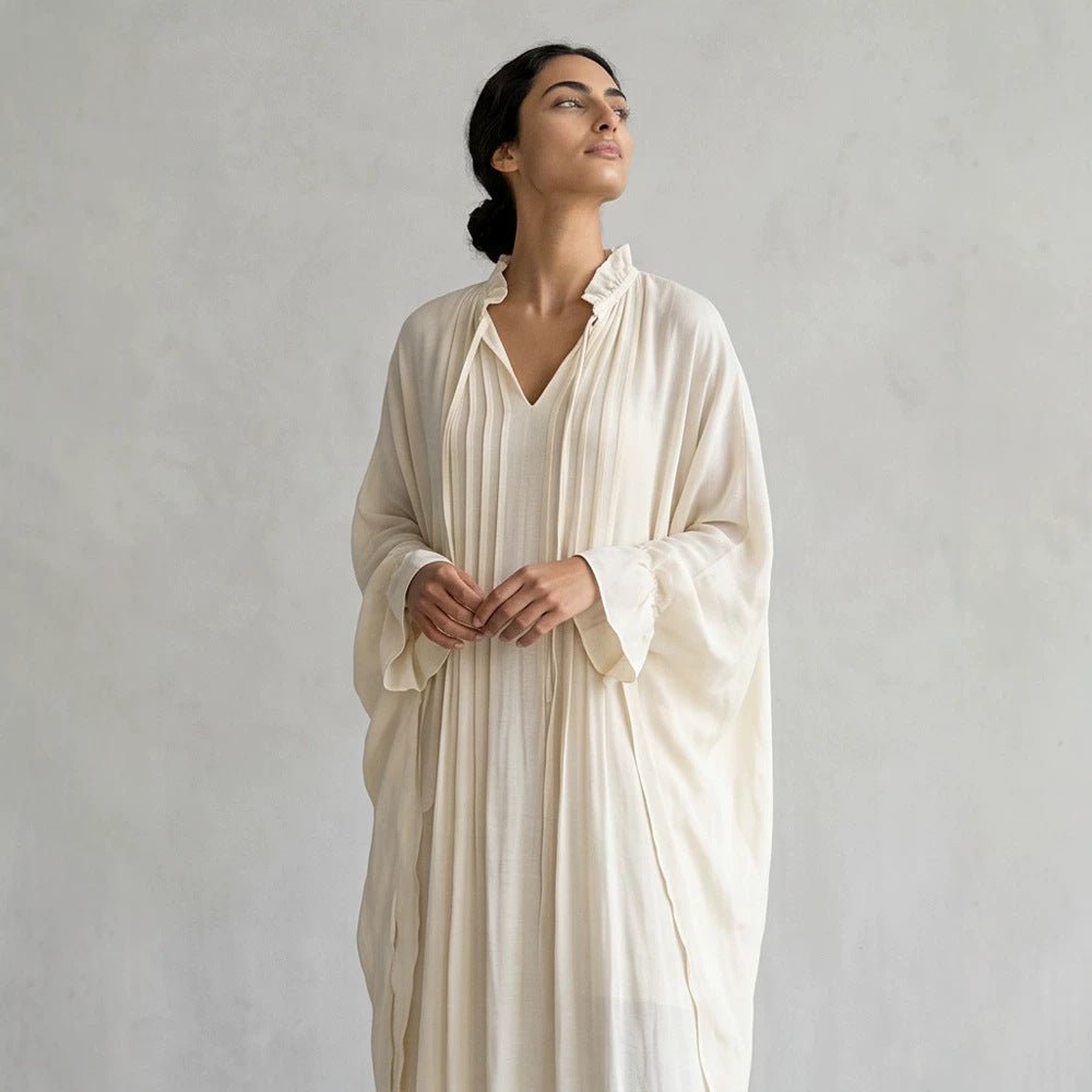 Women's maxi dress in kaftan style with ruffled collar, tie straps, and voluminous sleeves Chichicherry - Chichicherry