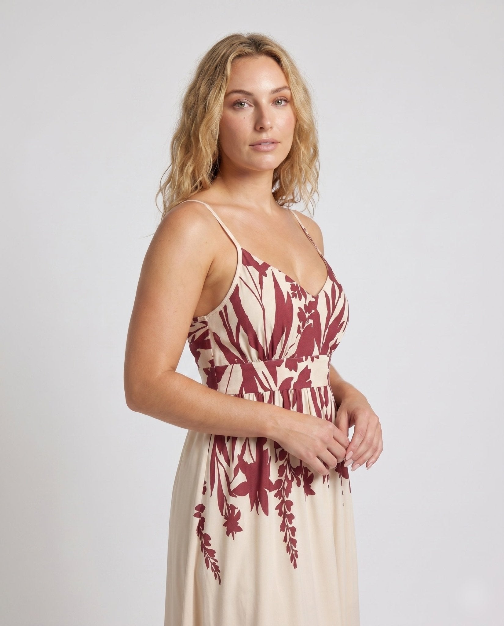 Women's Maxi Dress with Deep V-Neck and Floral Patterns - Chichicherry
