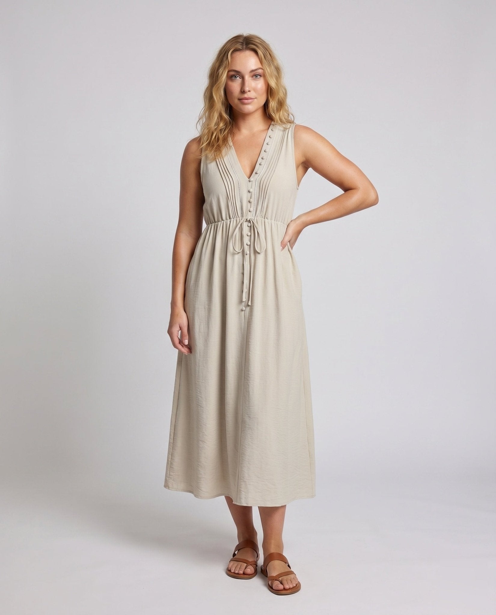Women's maxi dress with deep V-neckline and elegant button details - Chichicherry