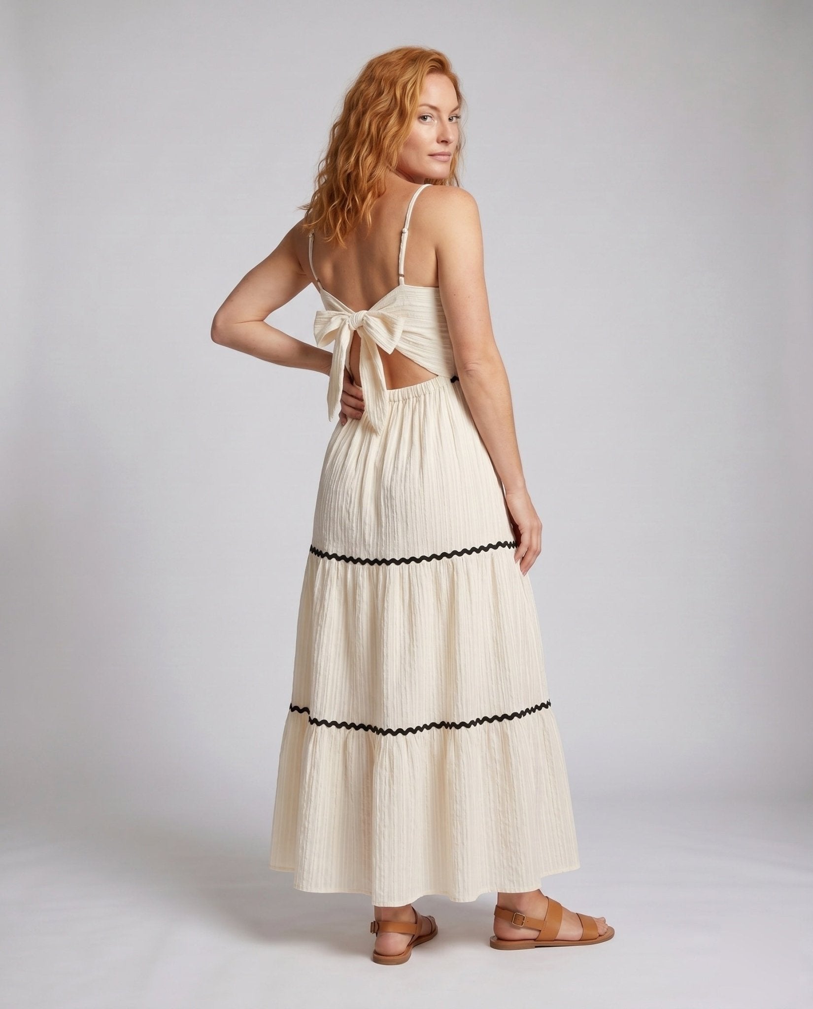 Women's maxi dress with fine ruffles and delicate straps - Chichicherry
