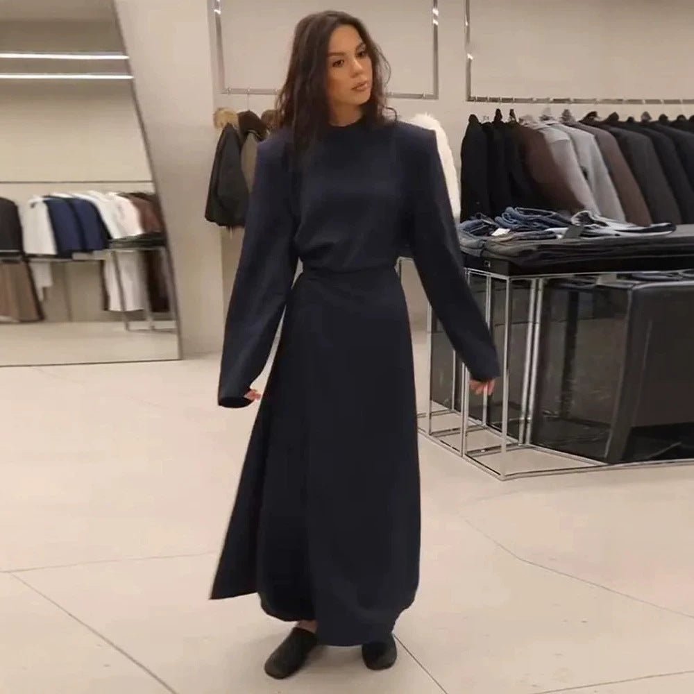 Women’s maxi dress with tailored silhouette, flared skirt and striking shoulders Chichicherry - Chichicherry