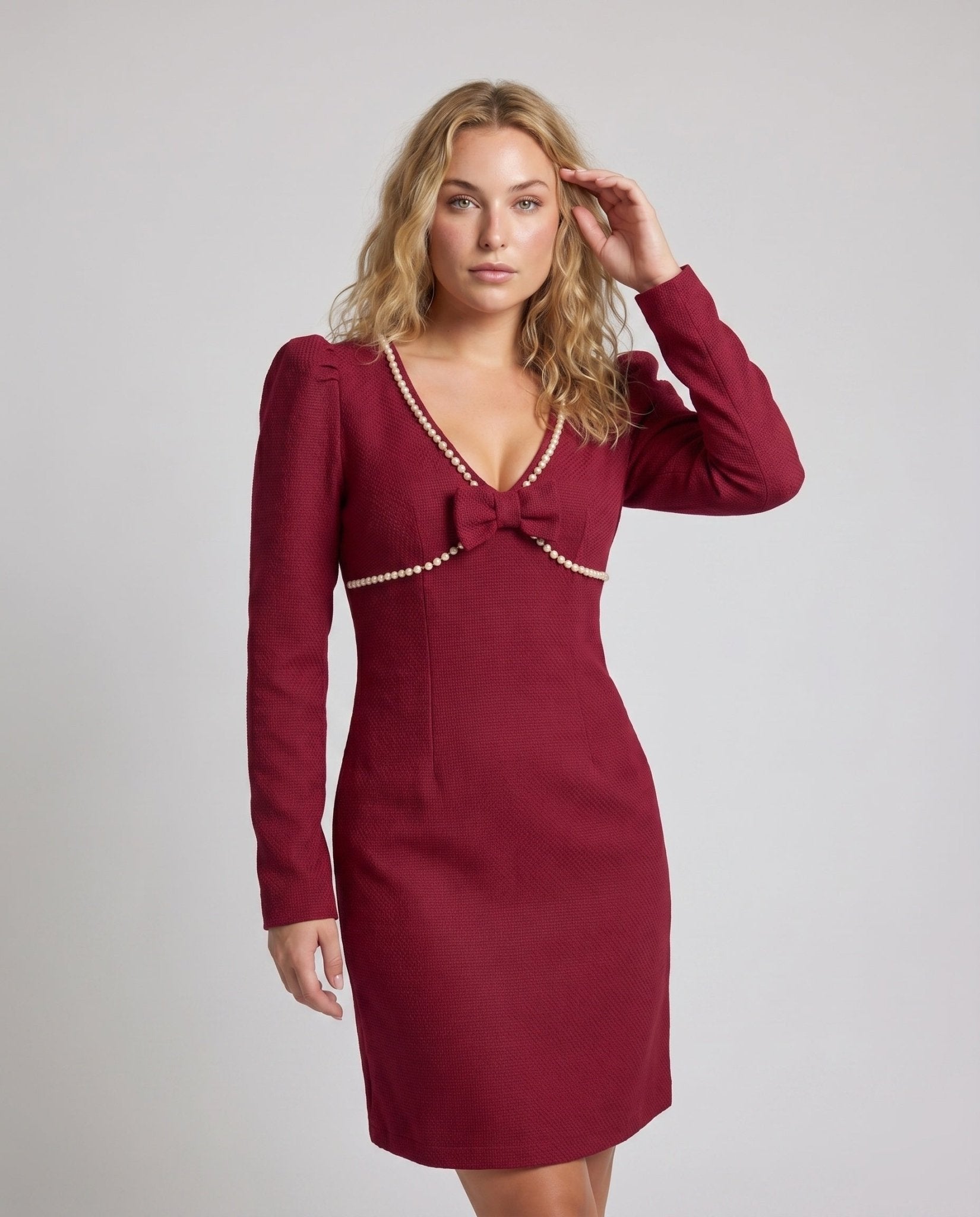 Women's midi dress with elegant puff sleeves and decorative bow accent - Chichicherry