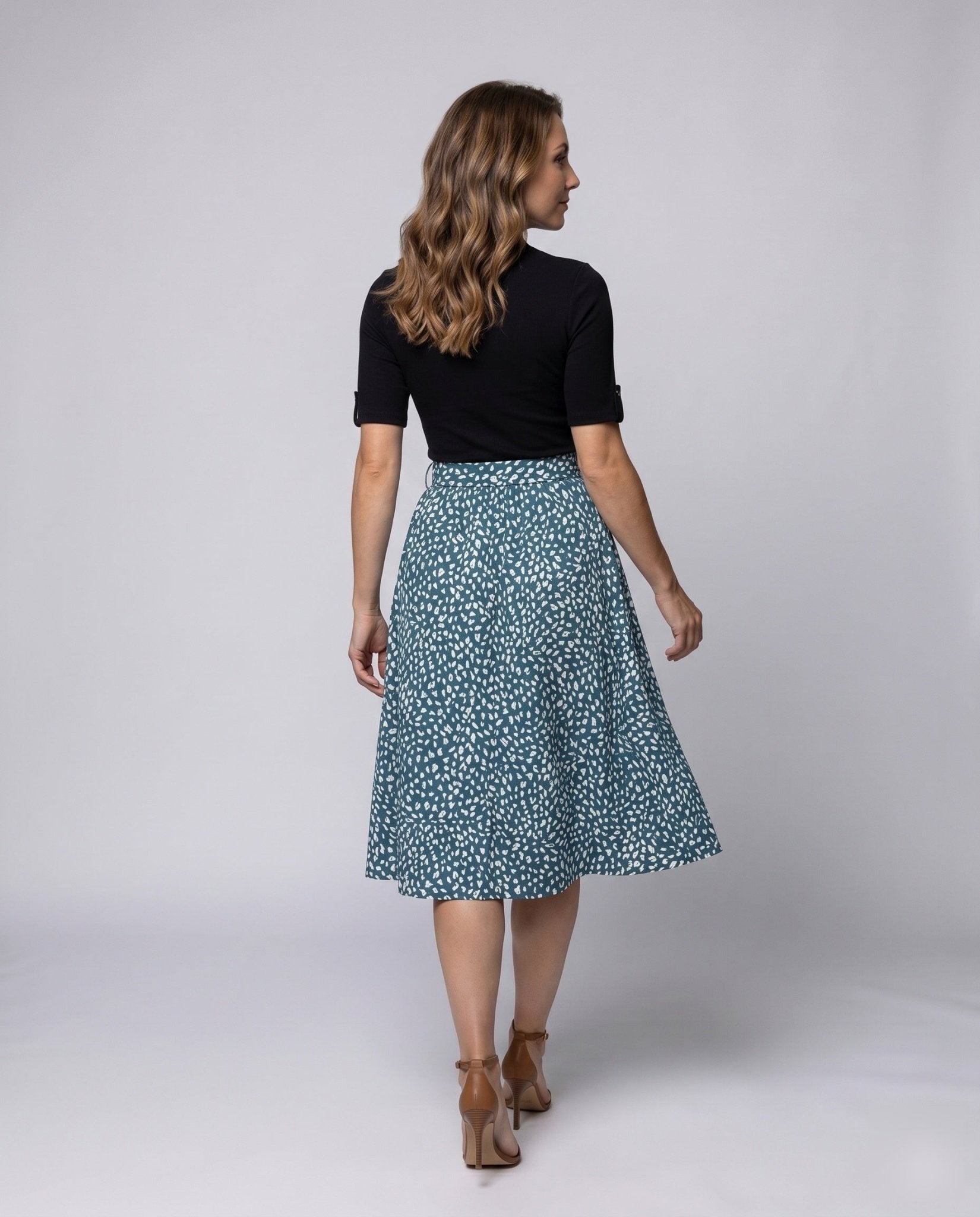Women's midi dress with elegant tie belt and stylish polka dot pattern - Chichicherry