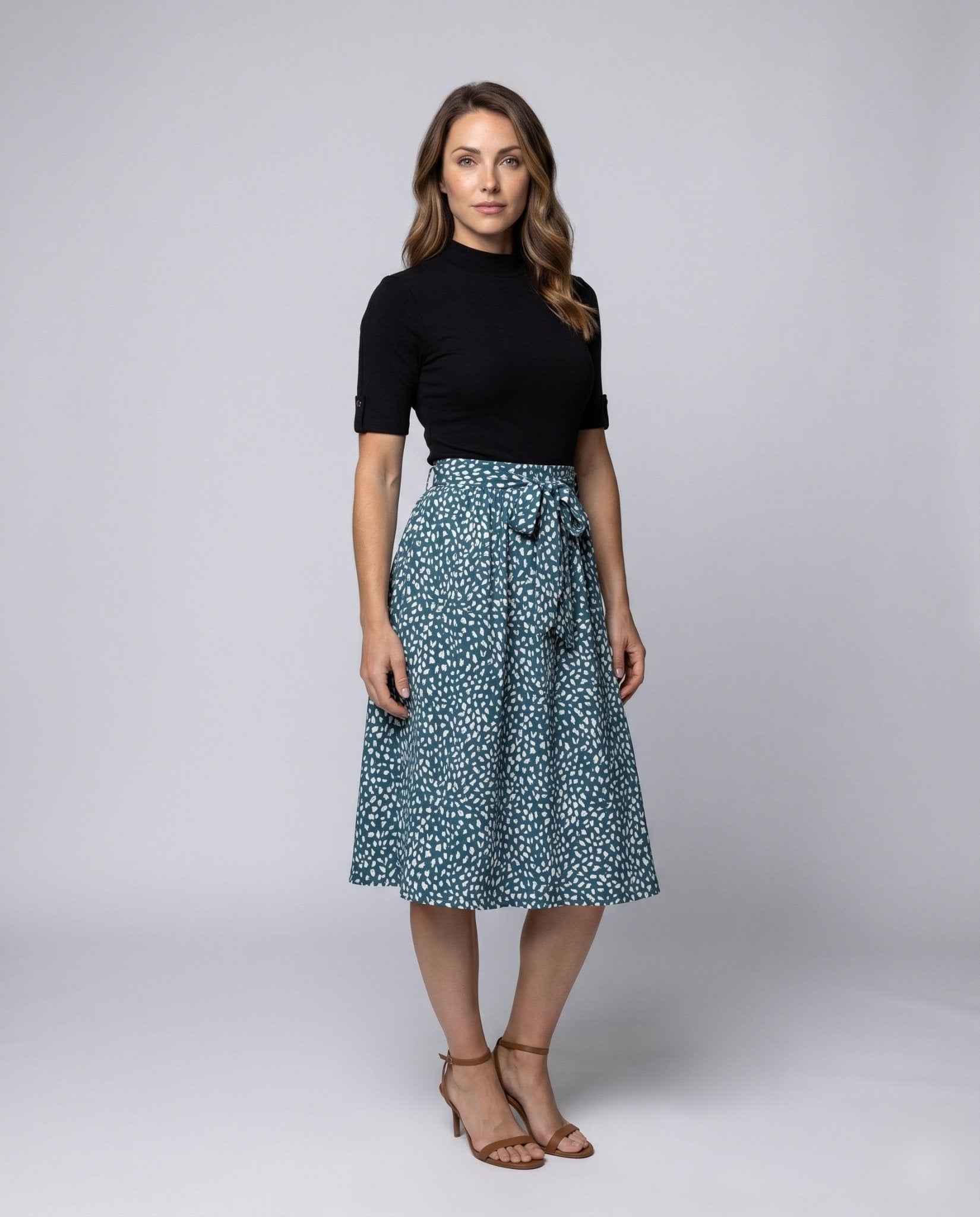 Women's midi dress with elegant tie belt and stylish polka dot pattern - Chichicherry