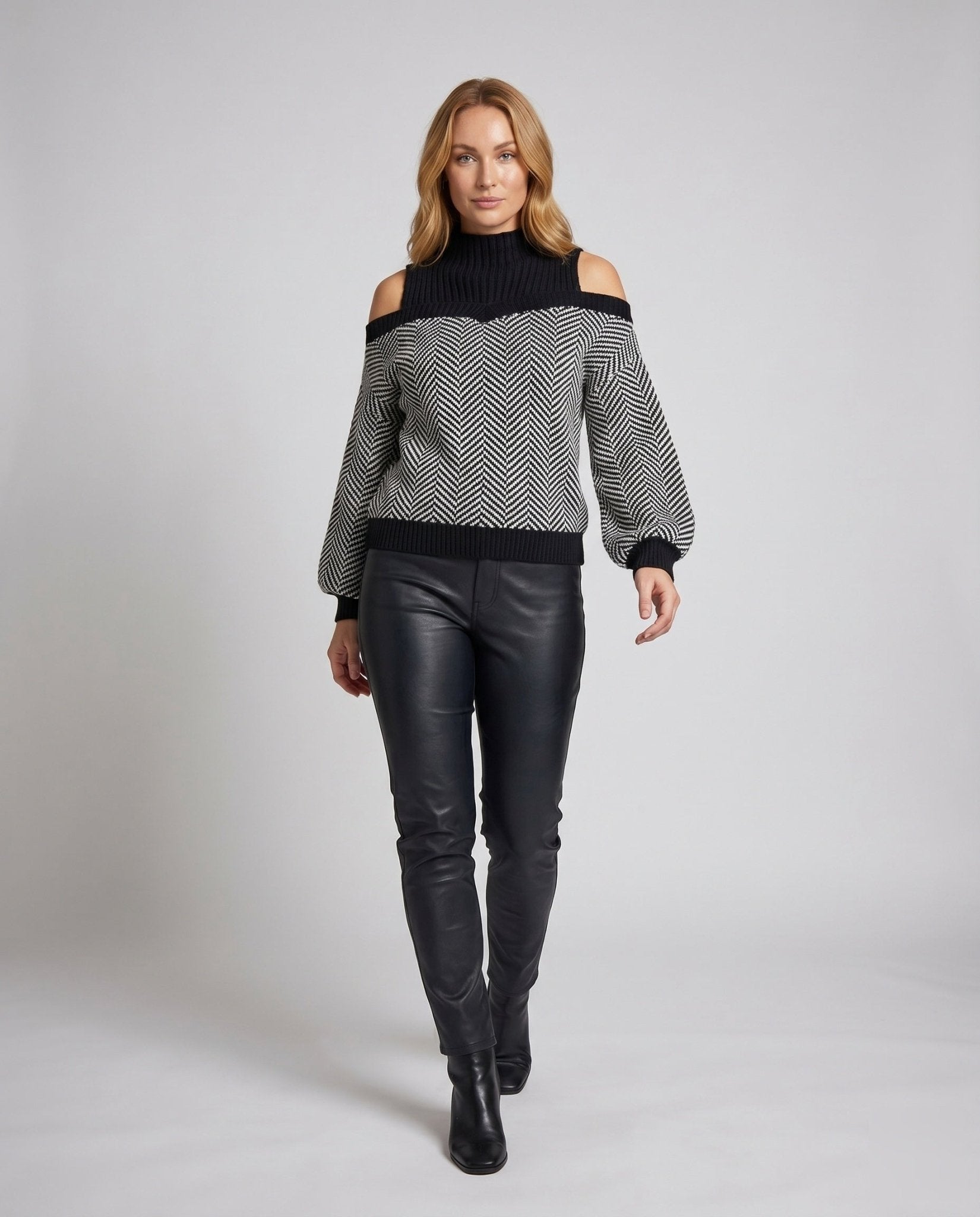 Women's oversized knit sweater with off-shoulder details and geometric pattern - Chichicherry