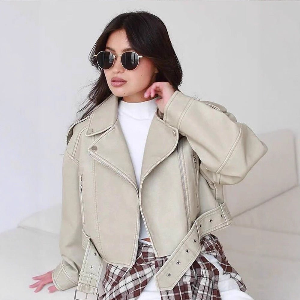 Women's short biker jacket made of vegan leather with a wide waist belt and visible decorative stitching Chichicherry - Chichicherry