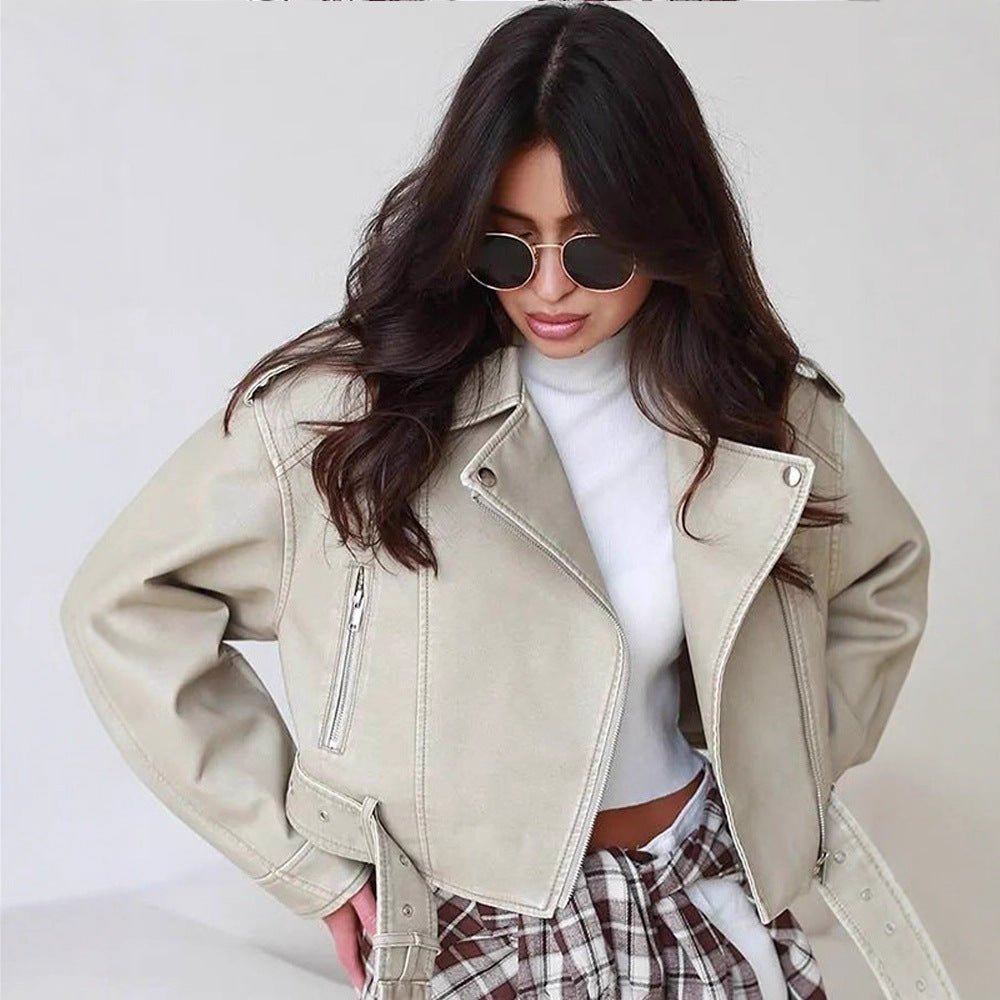 Women's short biker jacket made of vegan leather with a wide waist belt and visible decorative stitching Chichicherry - Chichicherry