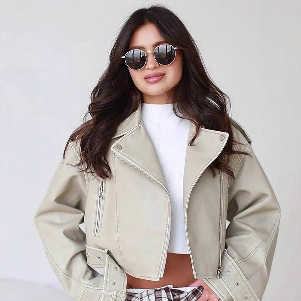 Women's short biker jacket made of vegan leather with a wide waist belt and visible decorative stitching Chichicherry - Chichicherry