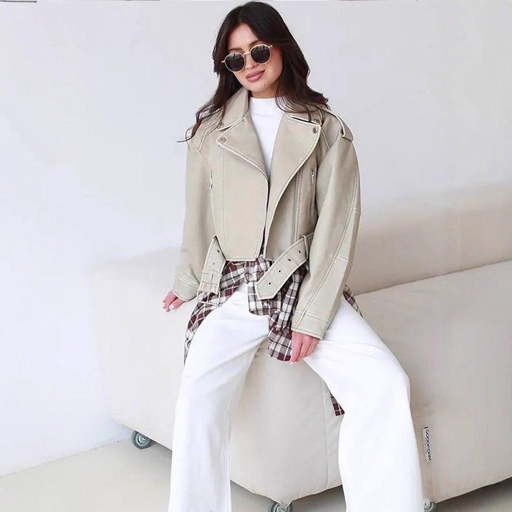 Women's short biker jacket made of vegan leather with a wide waist belt and visible decorative stitching Chichicherry - Chichicherry