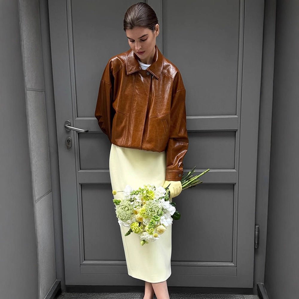 Women's short blazer made of vegan smooth leather with boxy silhouette and concealed snap button placket Chichicherry - Chichicherry