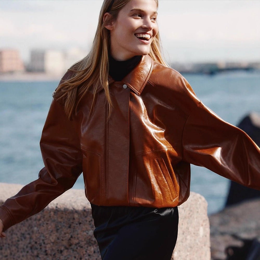 Women's short blazer made of vegan smooth leather with boxy silhouette and concealed snap button placket Chichicherry - Chichicherry