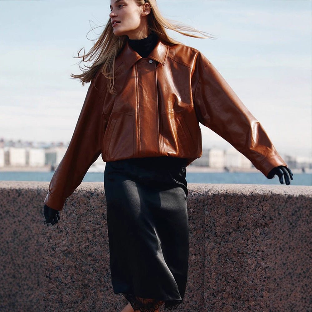 Women's short blazer made of vegan smooth leather with boxy silhouette and concealed snap button placket Chichicherry - Chichicherry