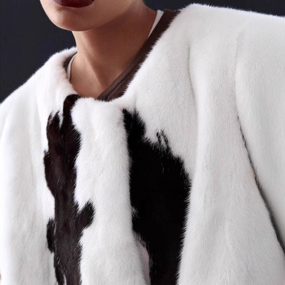 Women's short coat made of faux fur with boxy silhouette and cow print pattern Chichicherry - Chichicherry