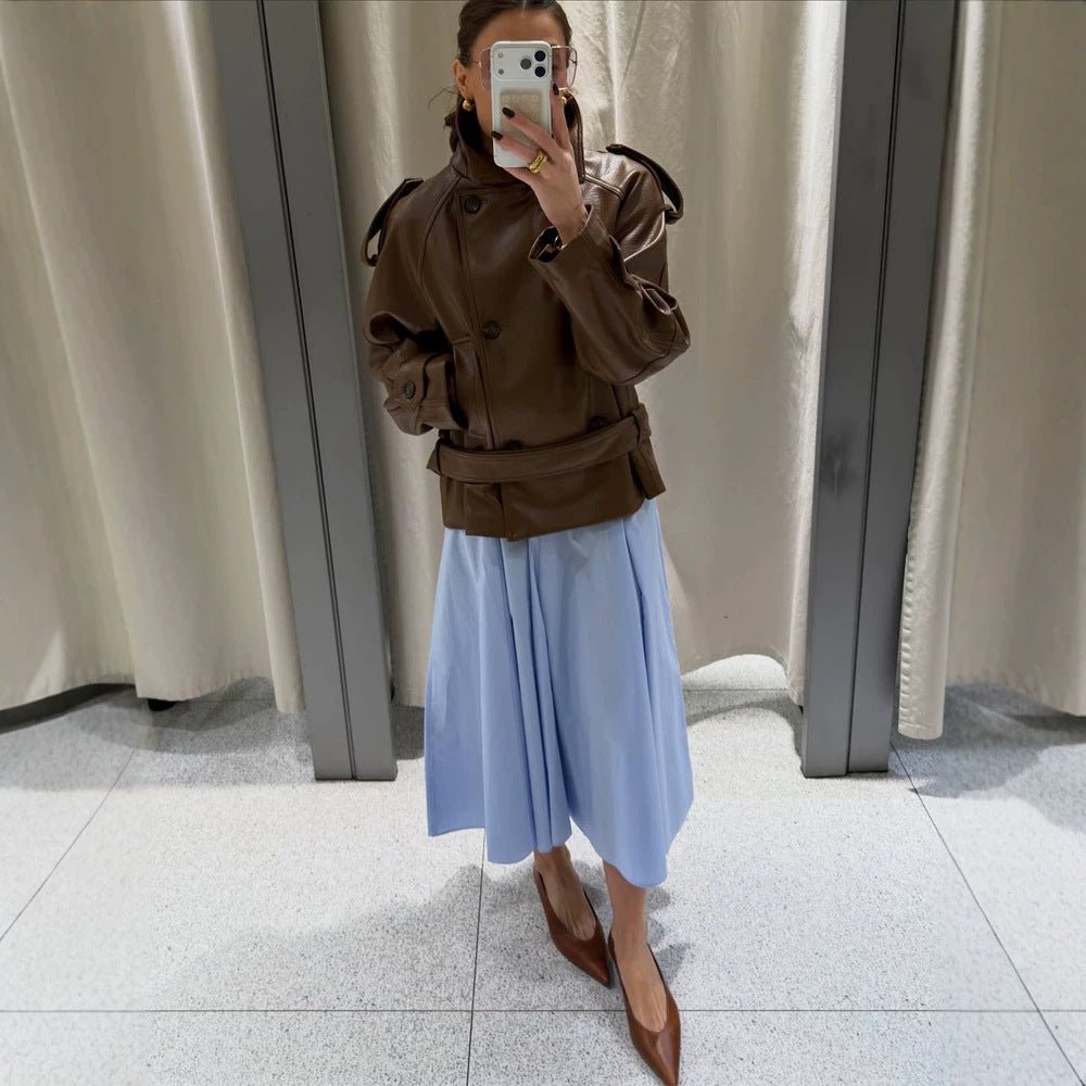 Women’s short cut oversized faux leather trench coat with waist belt and epaulettes Chichicherry - Chichicherry