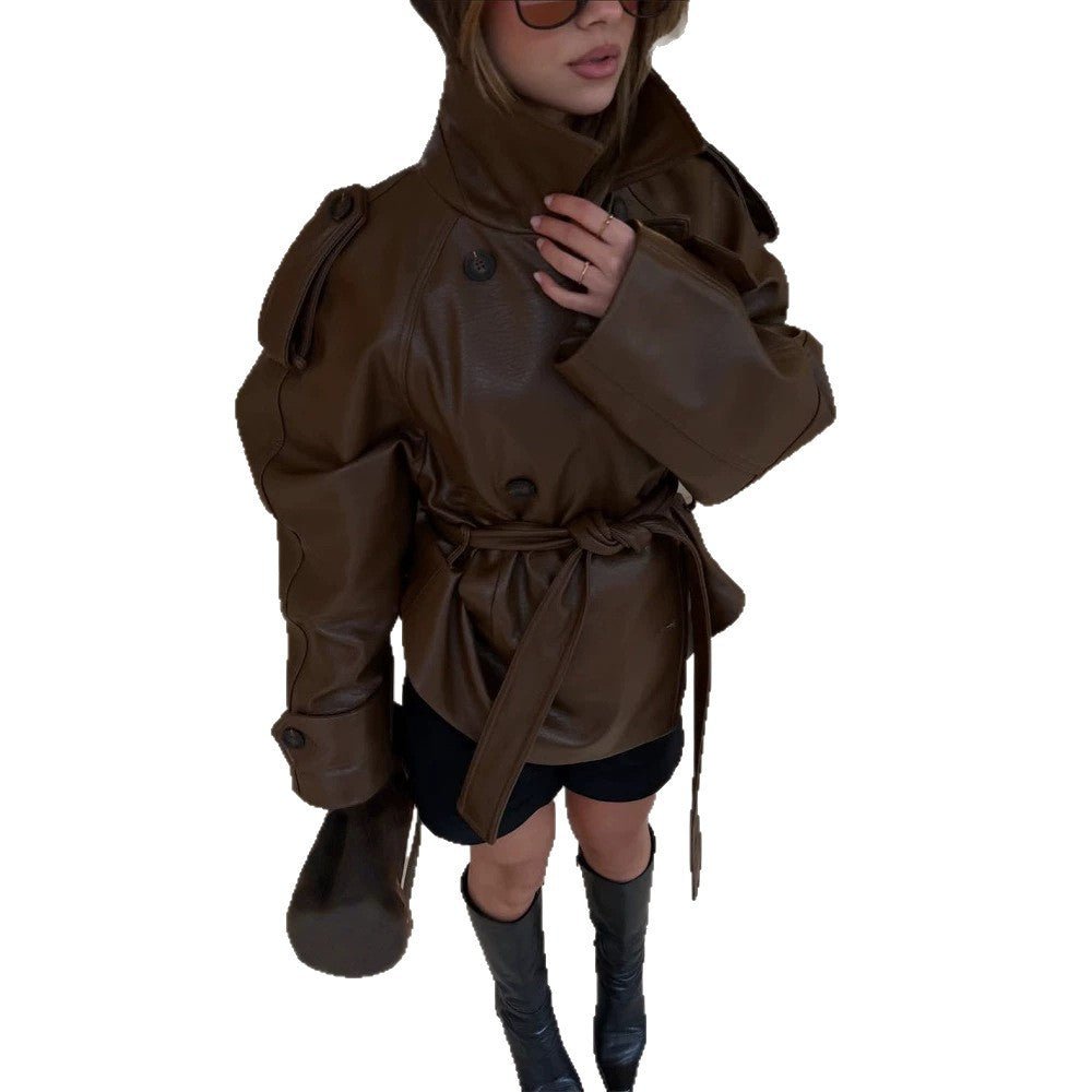 Women’s short cut oversized faux leather trench coat with waist belt and epaulettes Chichicherry - Chichicherry