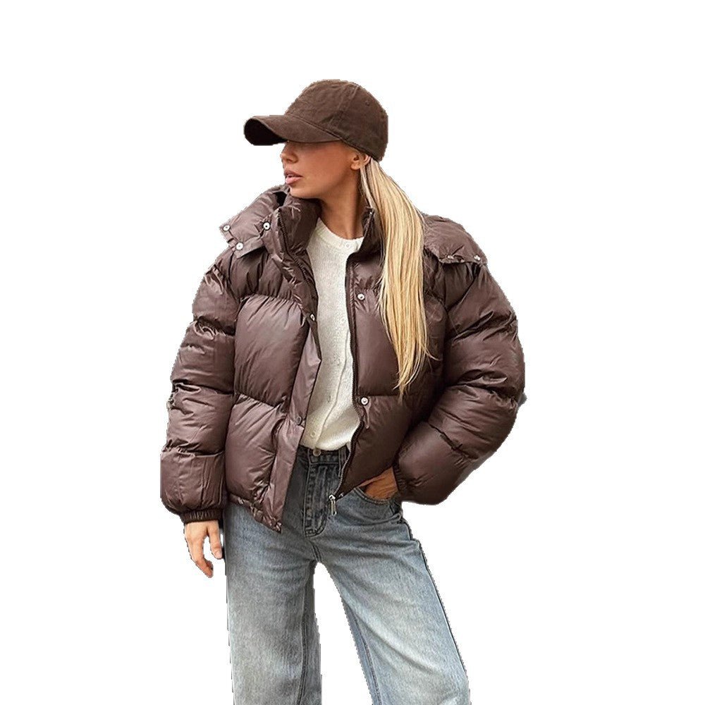 Women's short-cut shiny quilted jacket with high stand-up collar and snap-button placket Chichicherry - Chichicherry