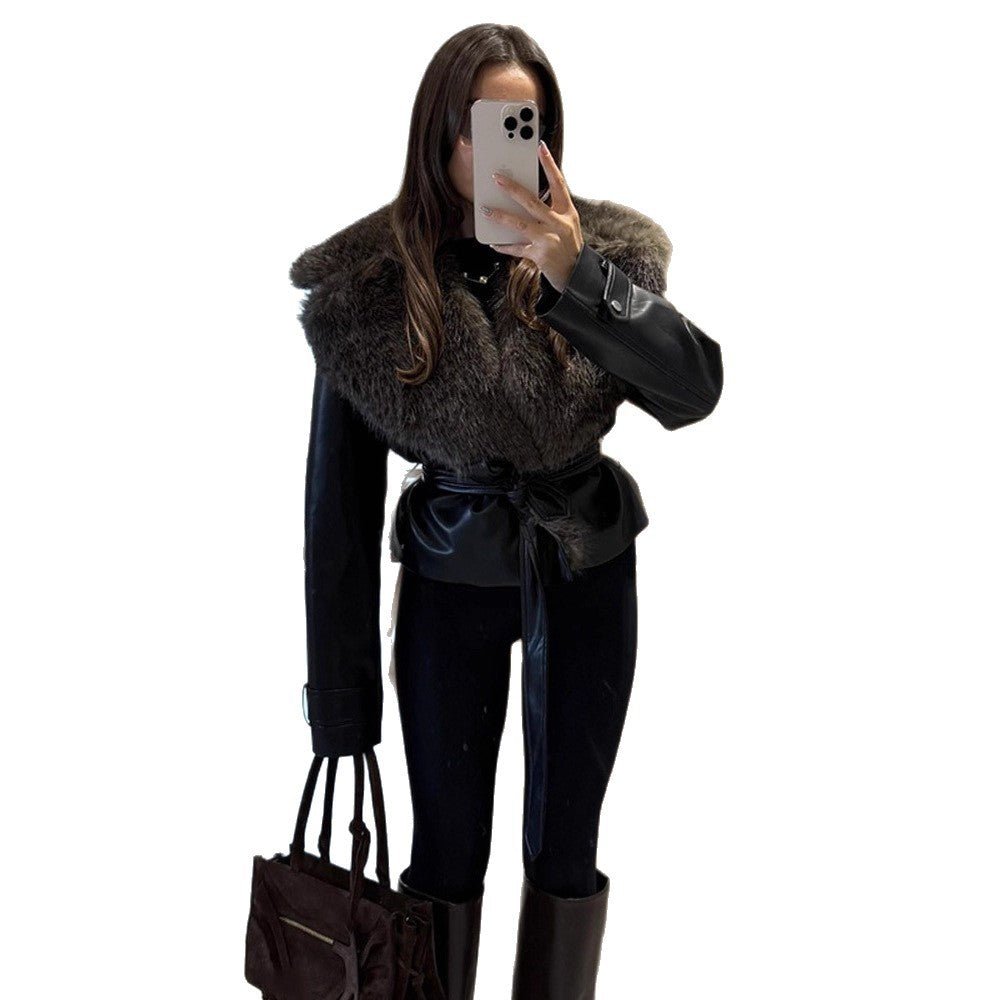 Women's short jacket in biker blouson style made of imitation leather with voluminous faux fur shawl collar and waist belt Chichicherry - Chichicherry