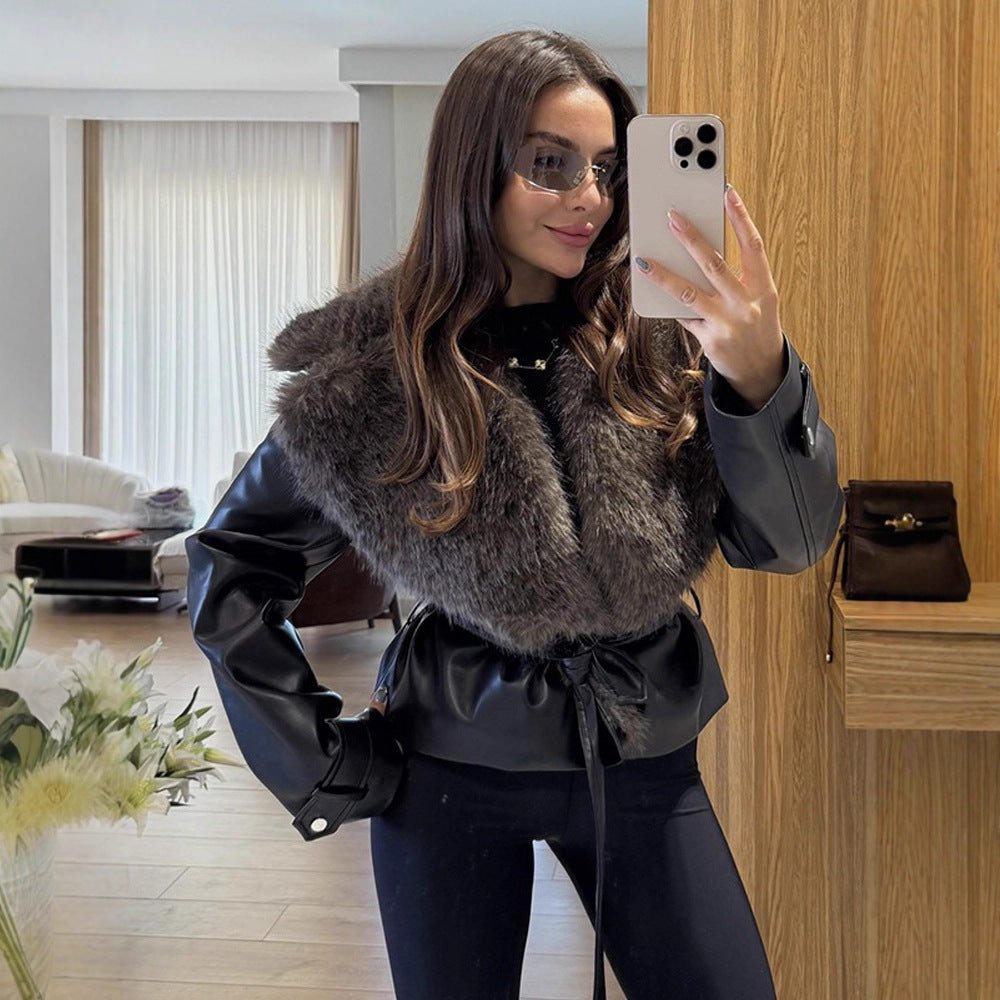 Women's short jacket in biker blouson style made of imitation leather with voluminous faux fur shawl collar and waist belt Chichicherry - Chichicherry