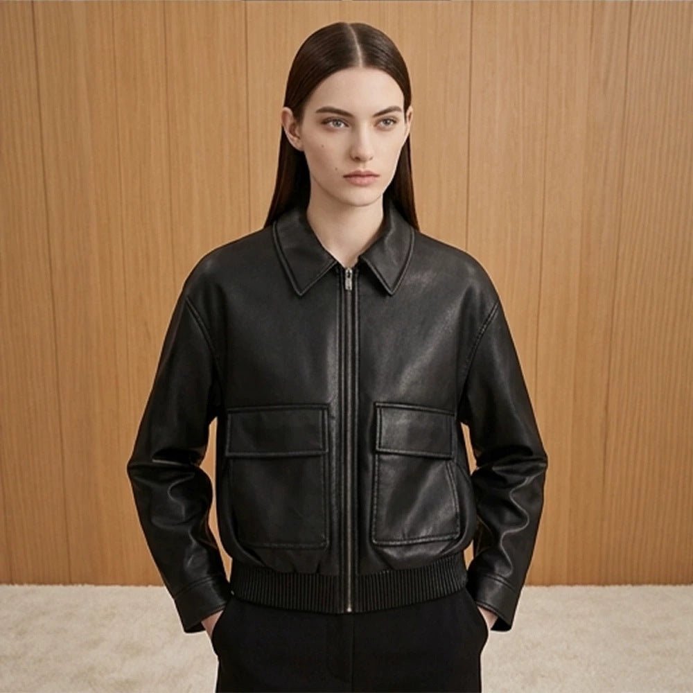 Women's short jacket made of faux leather in bomber style with ribbed hem and patch pockets Chichicherry - Chichicherry