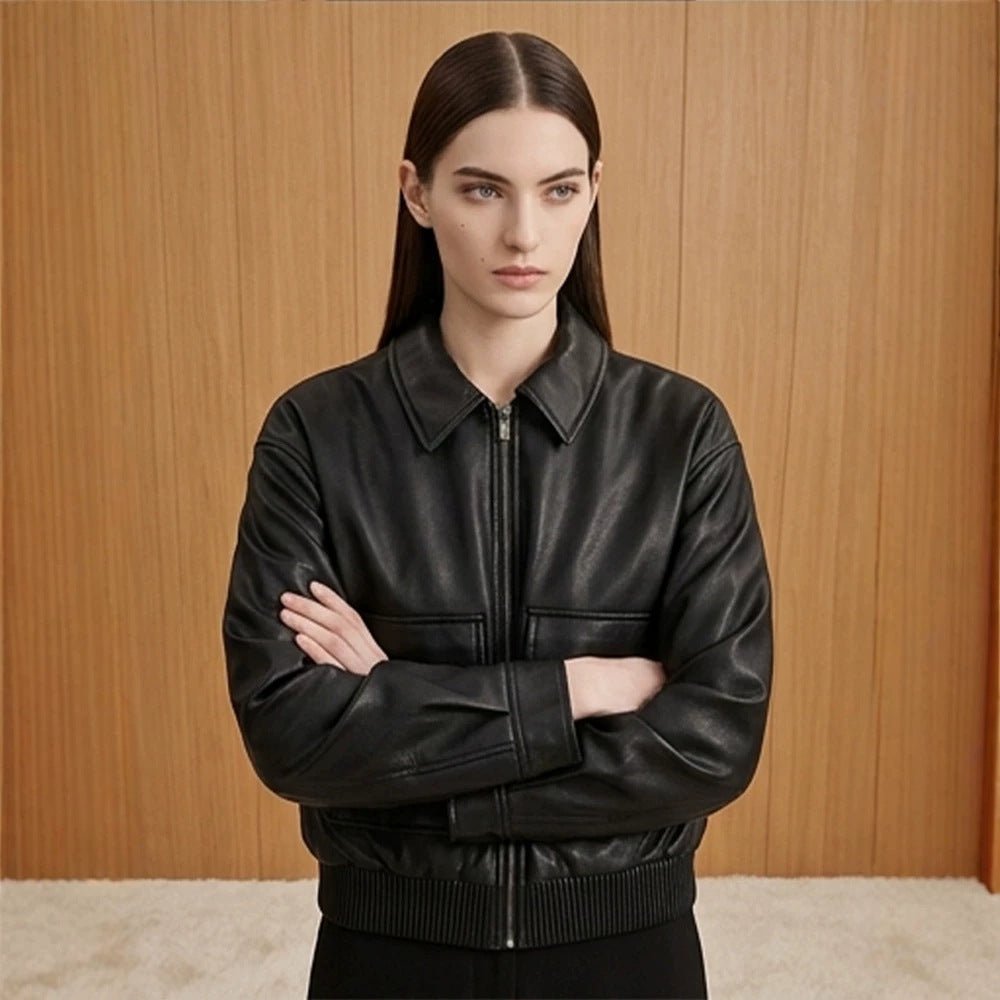 Women's short jacket made of faux leather in bomber style with ribbed hem and patch pockets Chichicherry - Chichicherry