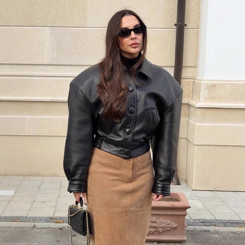 Women's short jacket made of vegan leather imitation in boxy cut with oversized shoulders and hidden button placket Chichicherry - Chichicherry