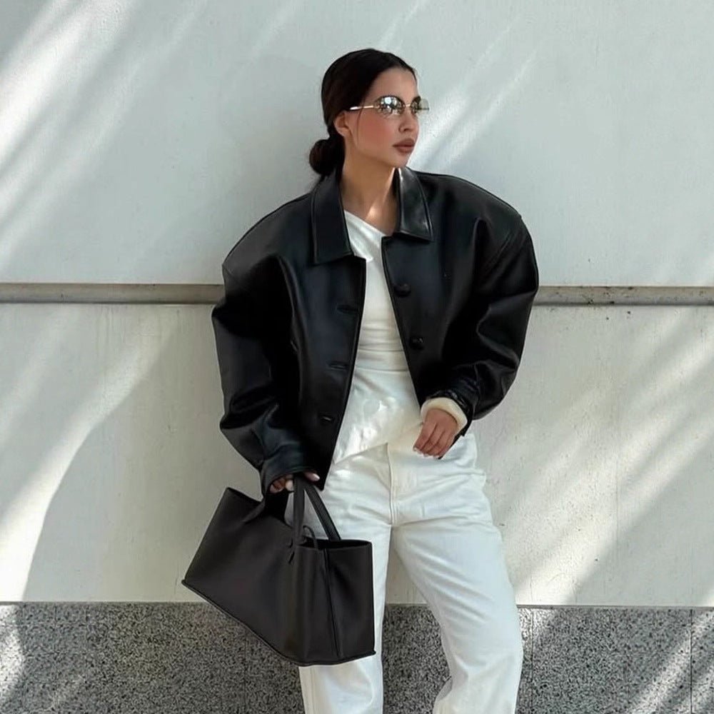 Women's short jacket made of vegan leather imitation in boxy cut with oversized shoulders and hidden button placket Chichicherry - Chichicherry