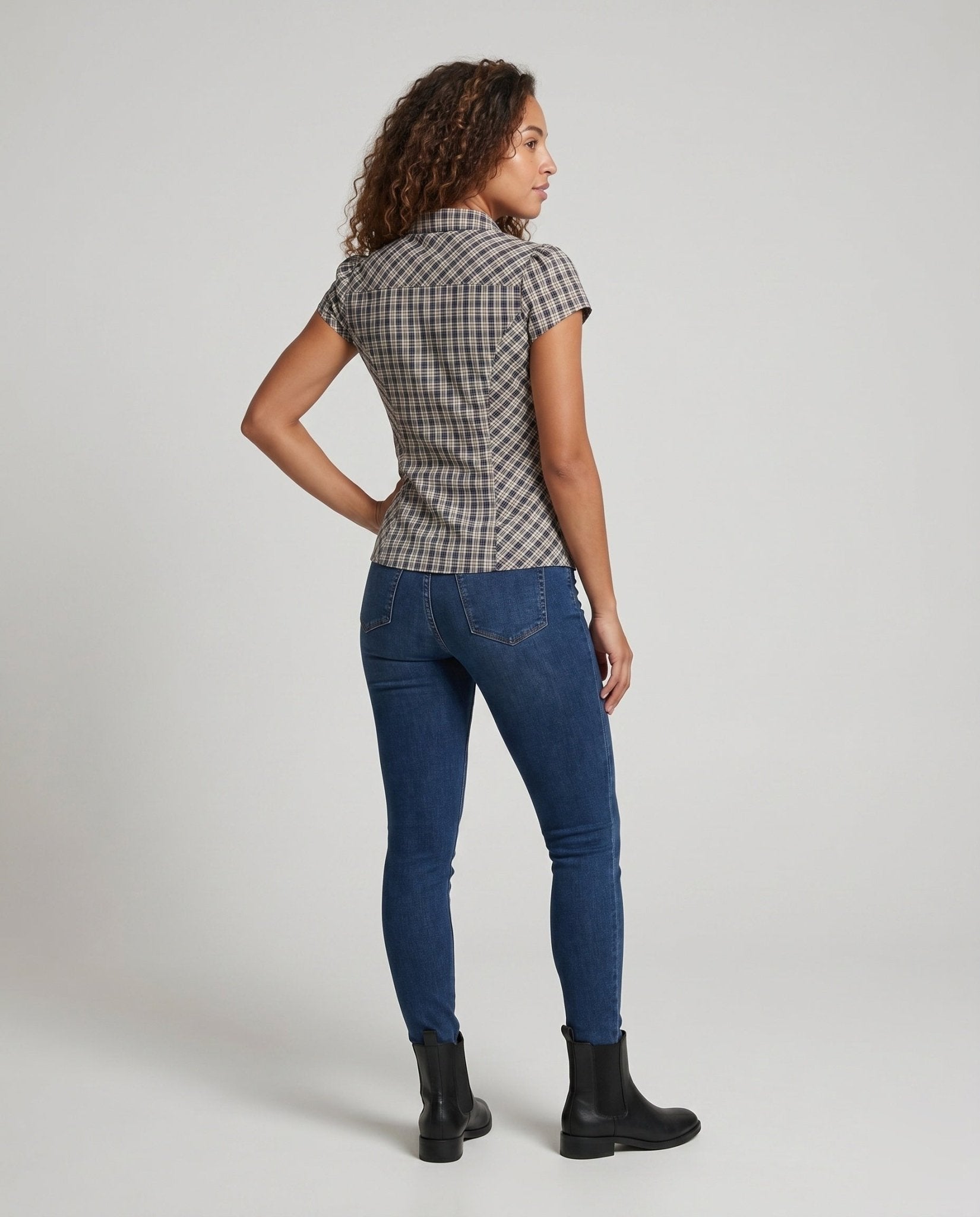 Women's short sleeve blouse in checkered design with ruffle details - Chichicherry