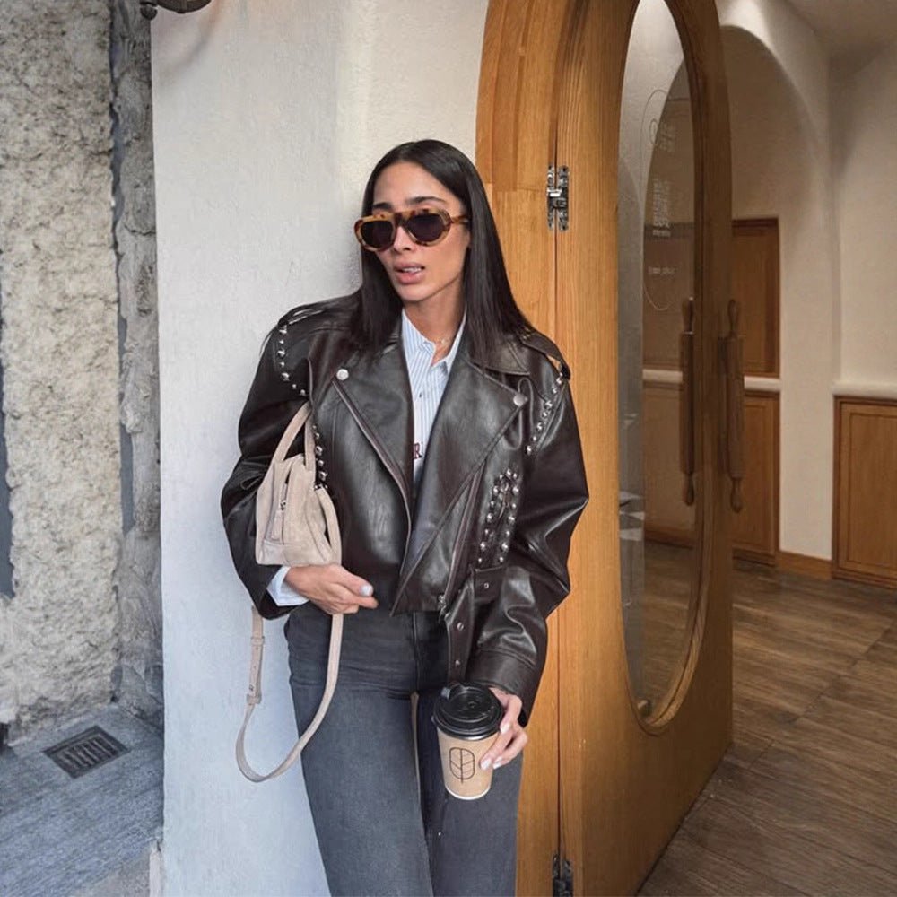 Women's Short Studded Biker Jacket Made of Faux Leather with Waist Belt Chichicherry - Chichicherry
