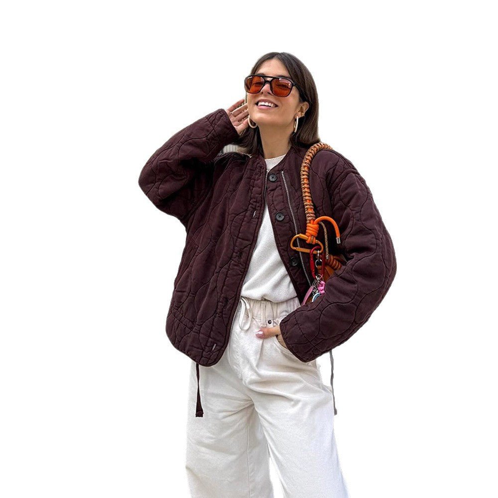 Women's shoulder bag made of synthetic leather with braided handle and spiral-shaped front grip Chichicherry - Chichicherry
