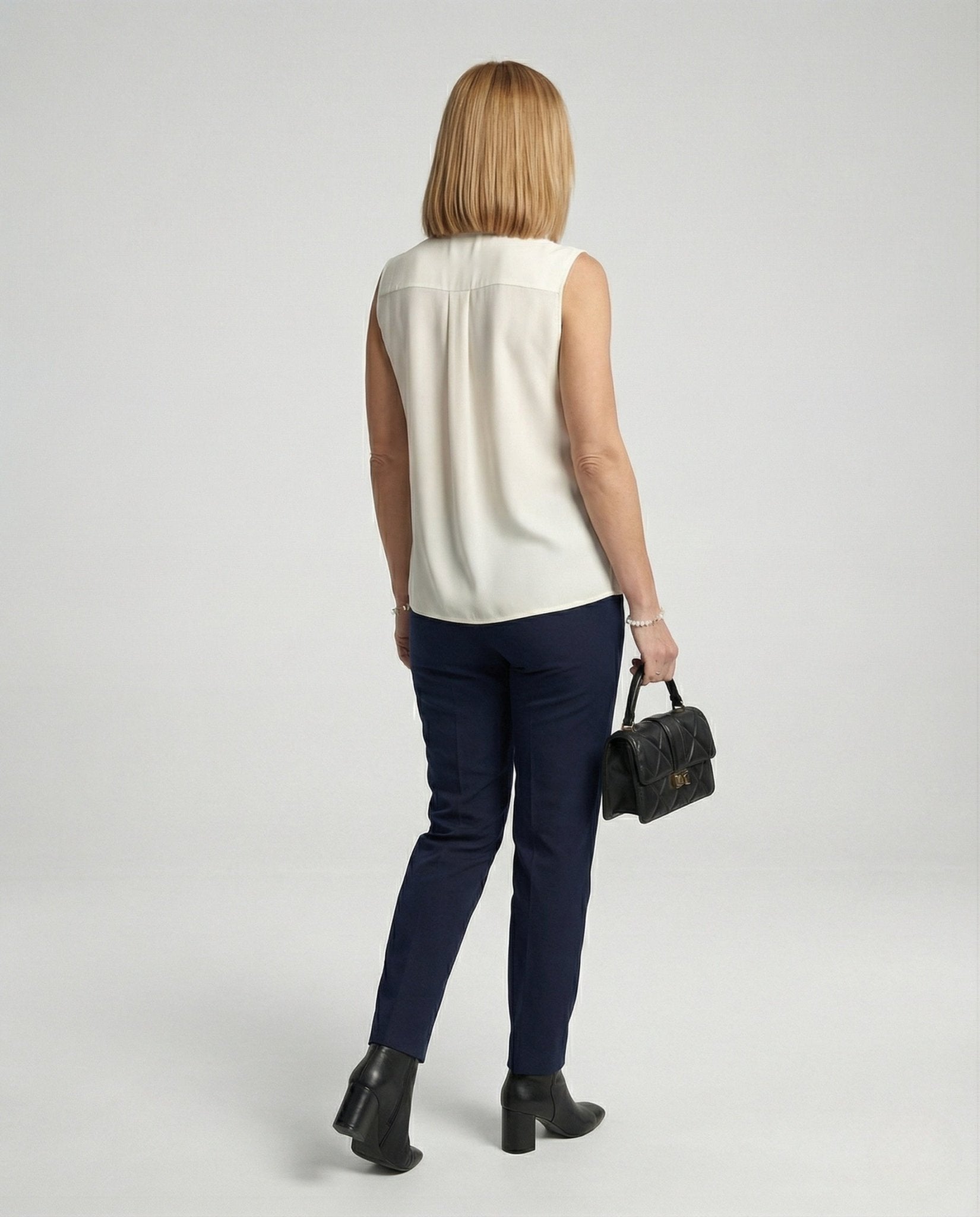 Women's Sleeveless Stand Collar Blouse with Pleats - Chichicherry