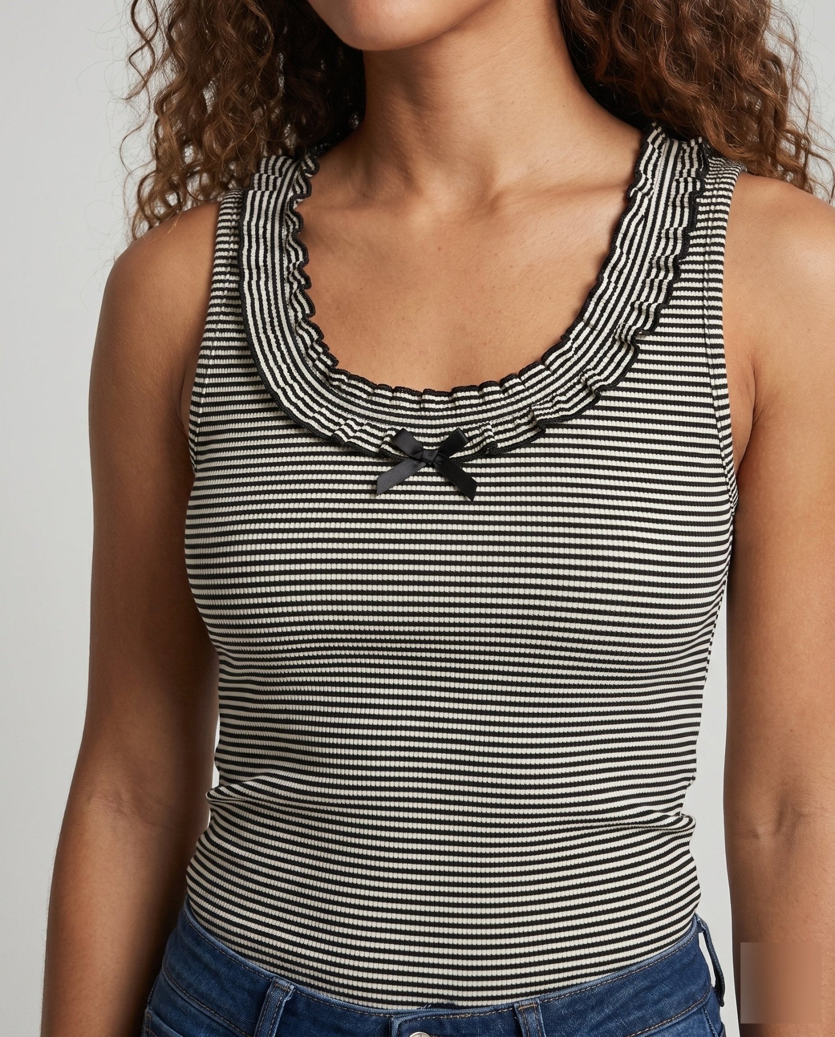 Women's sleeveless top with playful ruffle design and fine stripes - Chichicherry