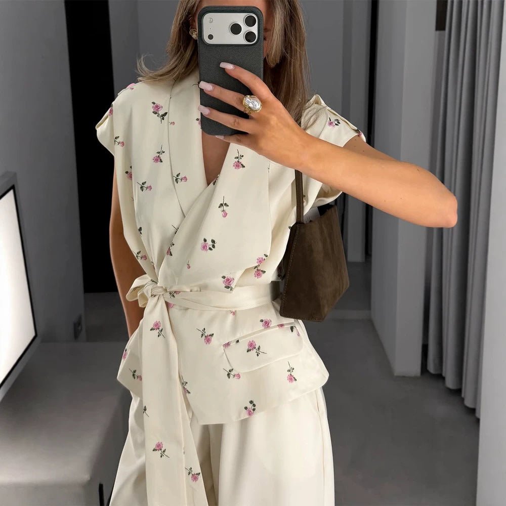Women's sleeveless wrap blouse with fitted tie belt and patch pockets Chichicherry - Chichicherry