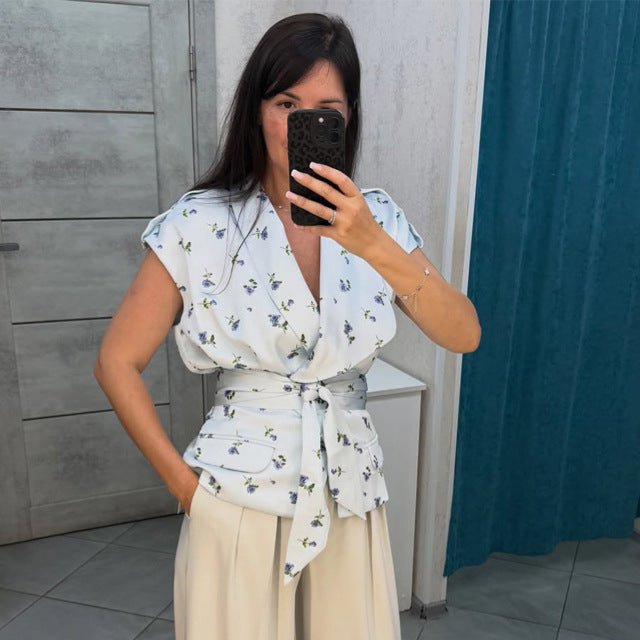 Women's sleeveless wrap blouse with fitted tie belt and patch pockets Chichicherry - Chichicherry