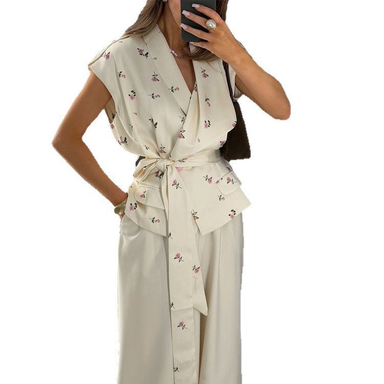 Women's sleeveless wrap blouse with fitted tie belt and patch pockets Chichicherry - Chichicherry